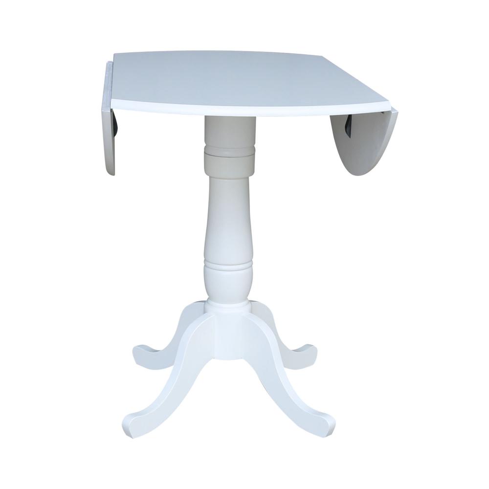 42 In Round dual drop Leaf Pedestal Table - 35.5 "H