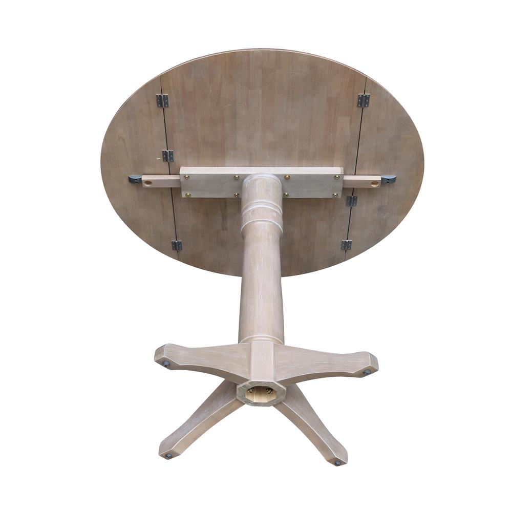 42" Round Dual Drop Leaf Pedestal Table - 36.3"H