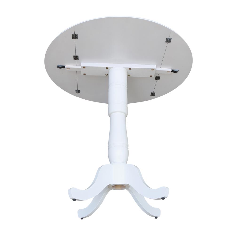 42 In Round dual drop Leaf Pedestal Table - 41.5 "H