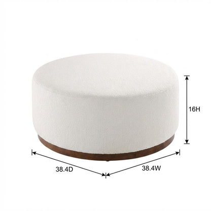 Round boucle upholstered outdoor ottoman with cushioned top, modern design