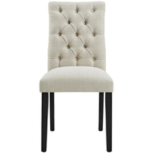Fabric dining chair with plush backrest and comfortable seat