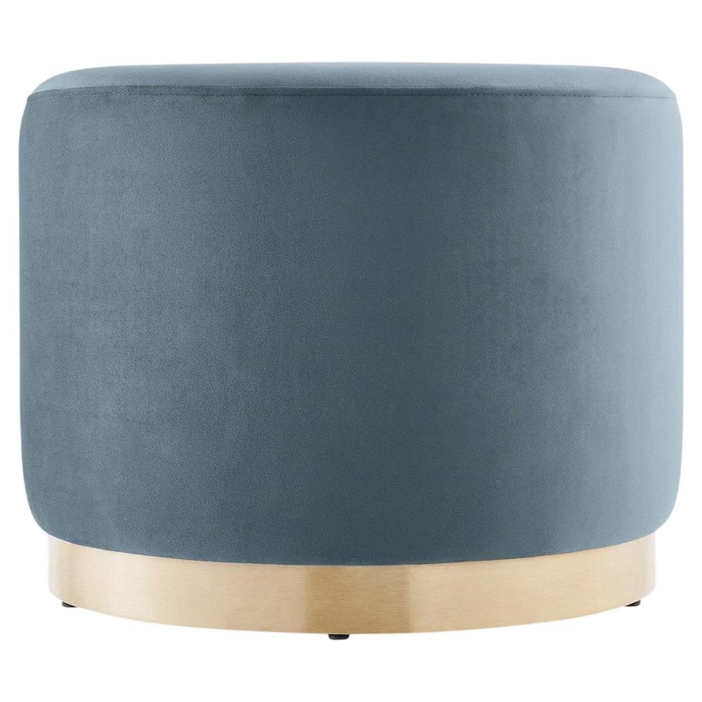 Round performance velvet ottoman with plush upholstery and versatile design