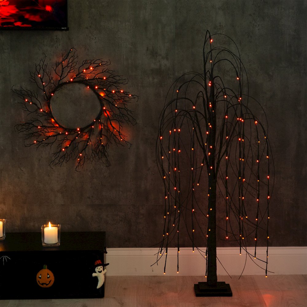4ft. Pre-Lit Halloween Black Willow Artificial Fall Tree with 120 Orange