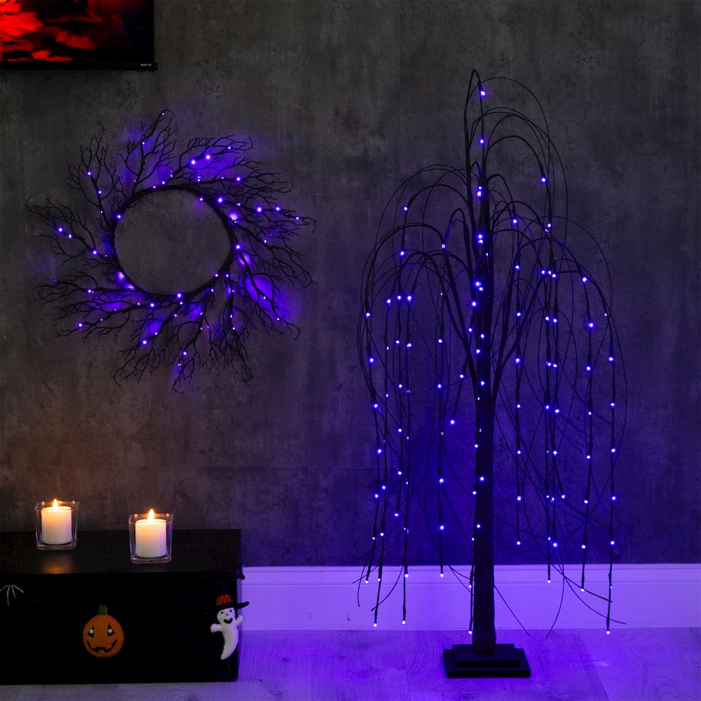 4ft. Pre-Lit Halloween Black Willow Artificial Fall Tree with 120 Orange