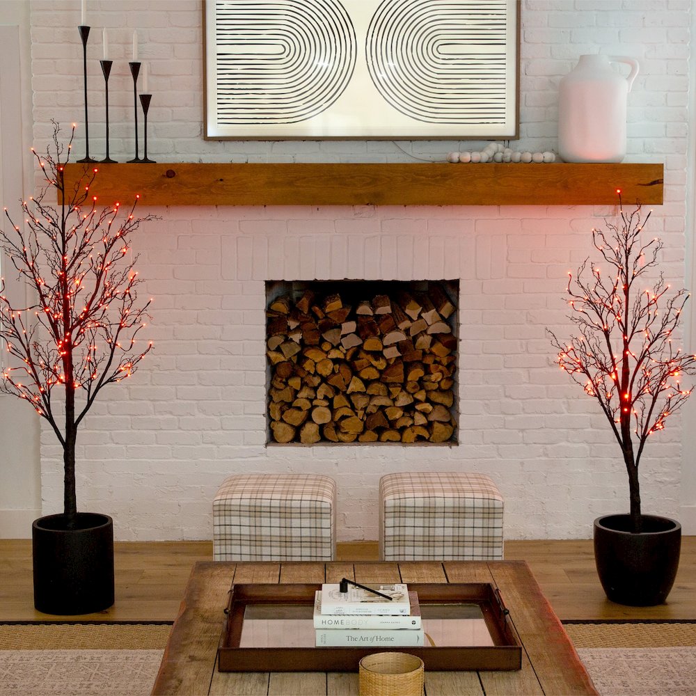 5ft. Pre-Lit Halloween Deluxe Black Twig Artificial Fall Tree with 102 Orange