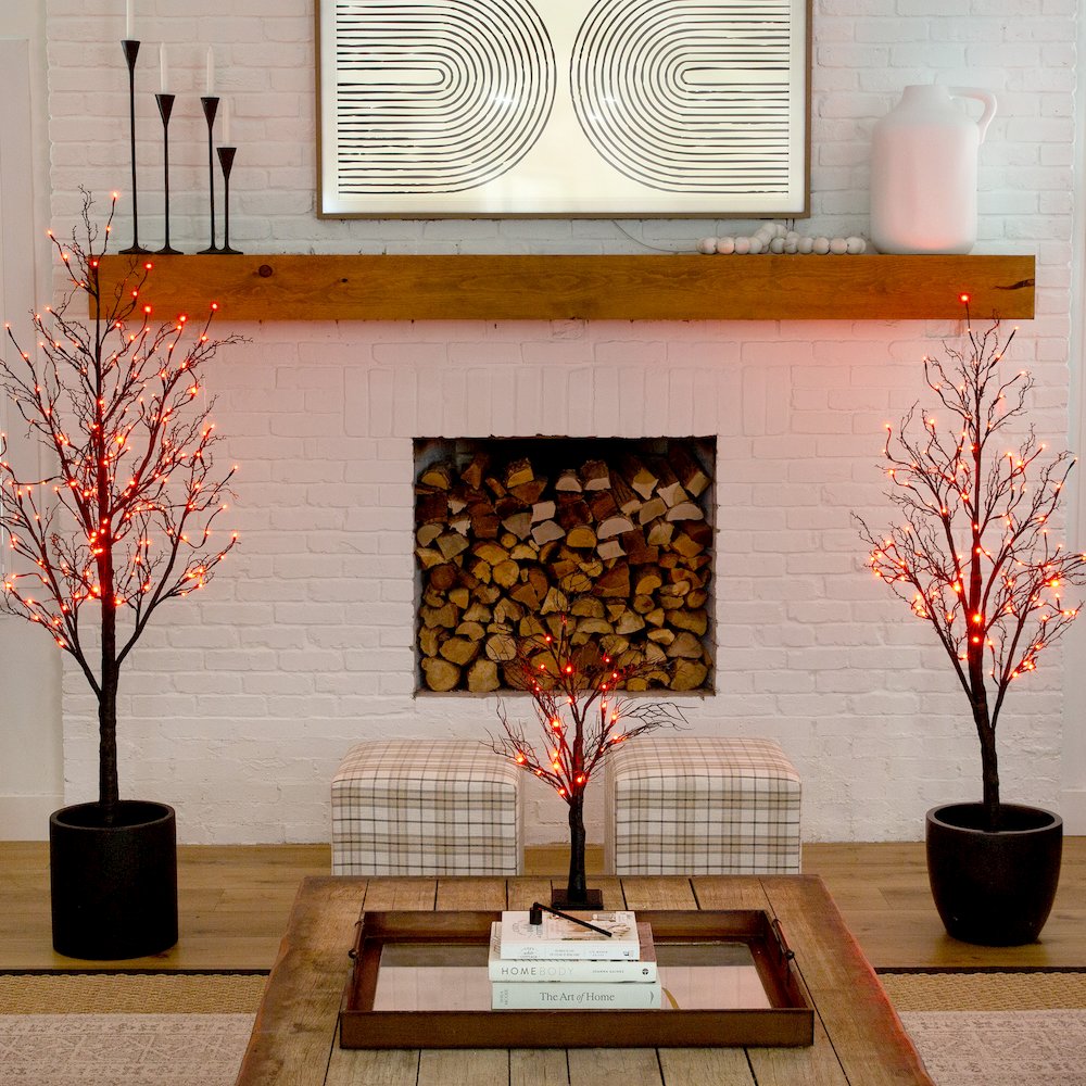 5ft. Pre-Lit Halloween Deluxe Black Twig Artificial Fall Tree with 102 Orange