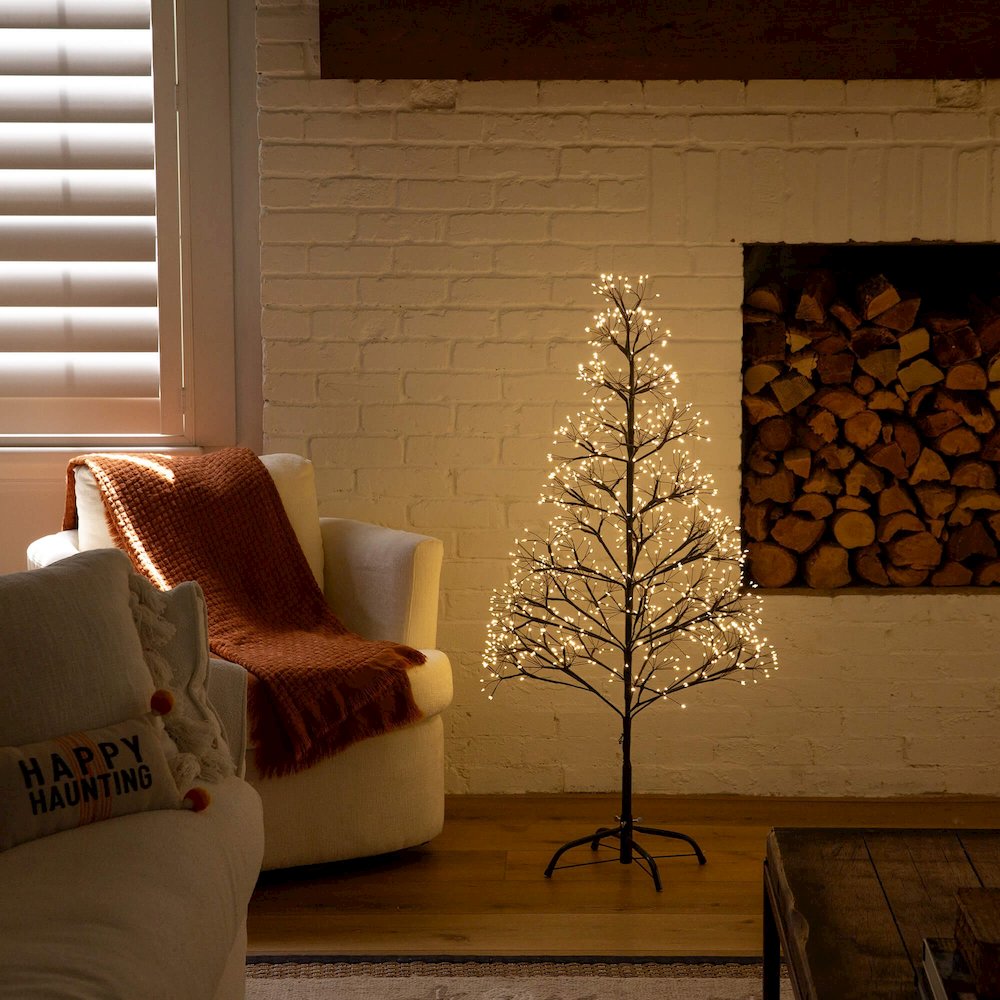 4ft. Pre-Lit Artificial Halloween Black Starburst Tree with 800 Fairy LED Lights