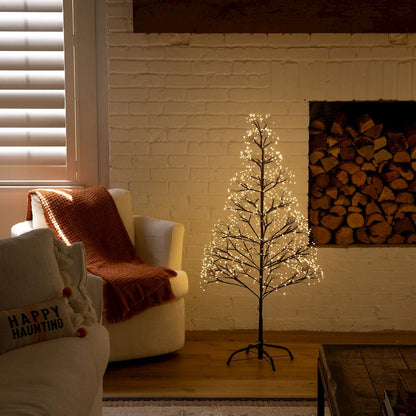4ft. Pre-Lit Artificial Halloween Black Starburst Tree with 800 Fairy LED Lights