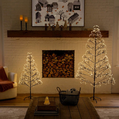 4ft. Pre-Lit Artificial Halloween Black Starburst Tree with 800 Fairy LED Lights
