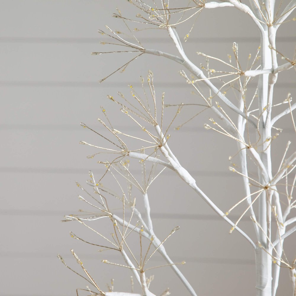 6ft. Pre-Lit Artificial White Starburst Tree with 1680 Fairy LED Lights