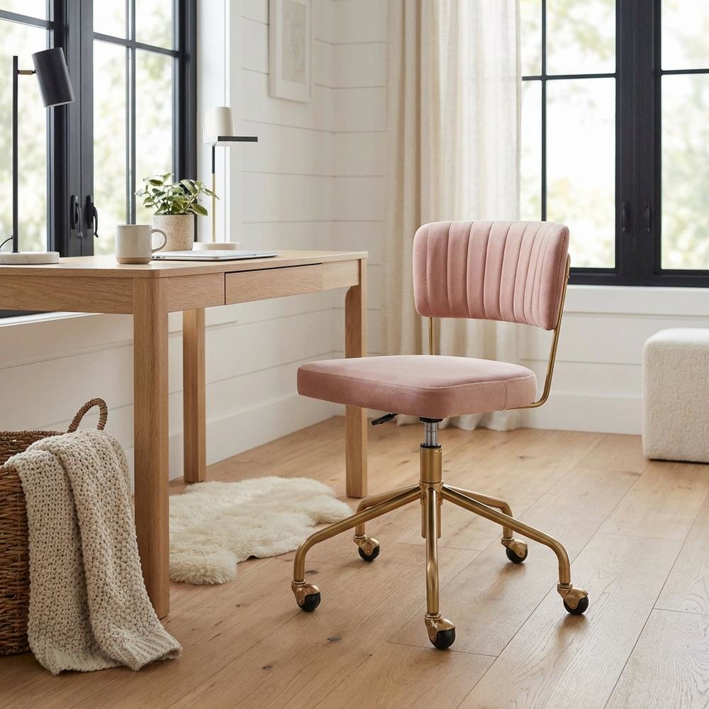 Pink velvet task chair with gold painted steel frame and cushioned seat