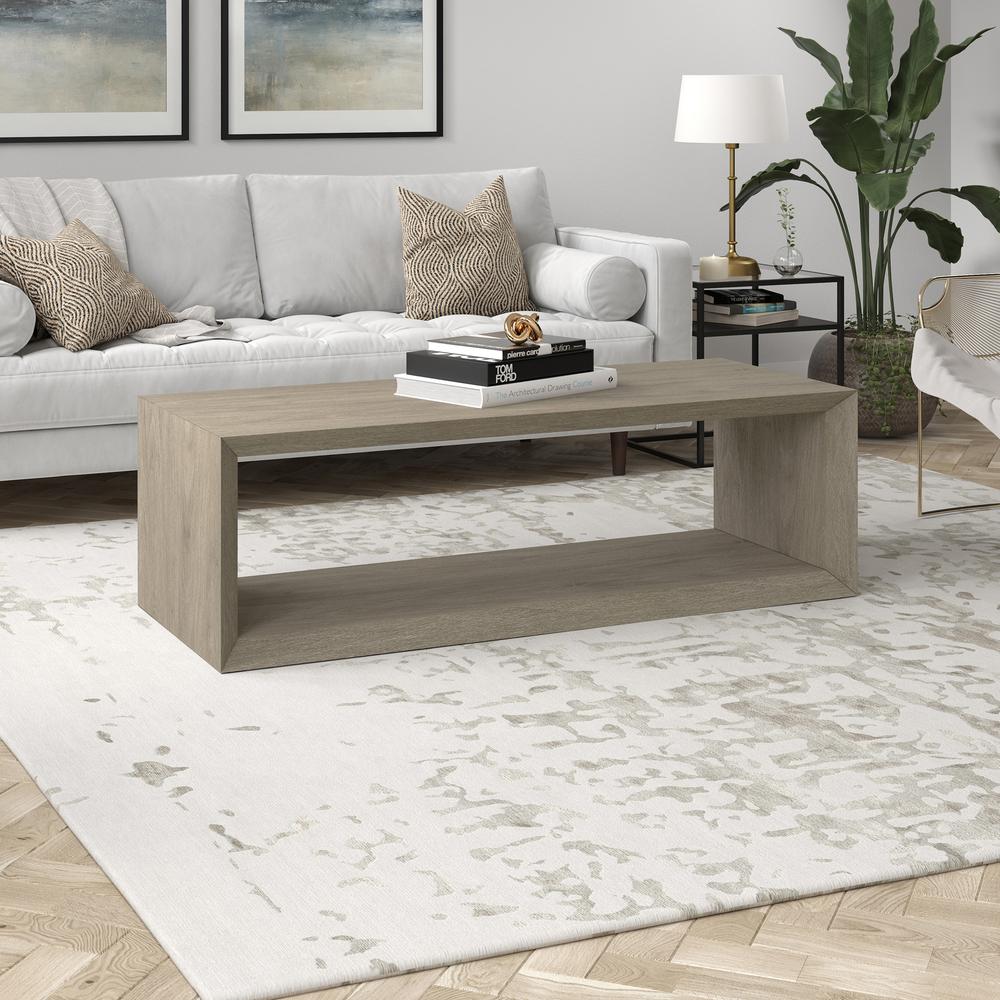 Osmond 58" Wide Rectangular Coffee Table in Antiqued Gray Oak