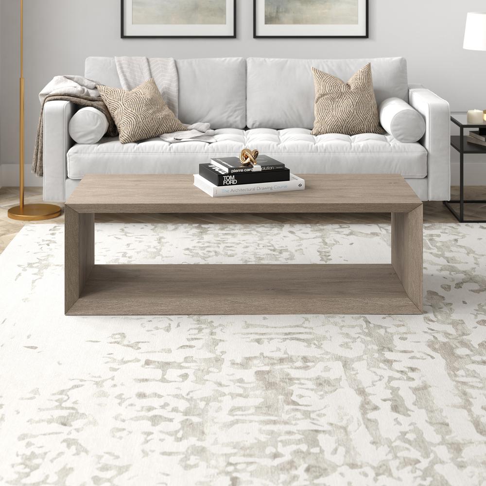 Osmond 58" Wide Rectangular Coffee Table in Antiqued Gray Oak