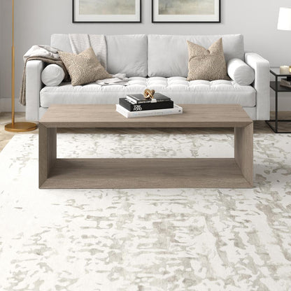 Osmond 58" Wide Rectangular Coffee Table in Antiqued Gray Oak