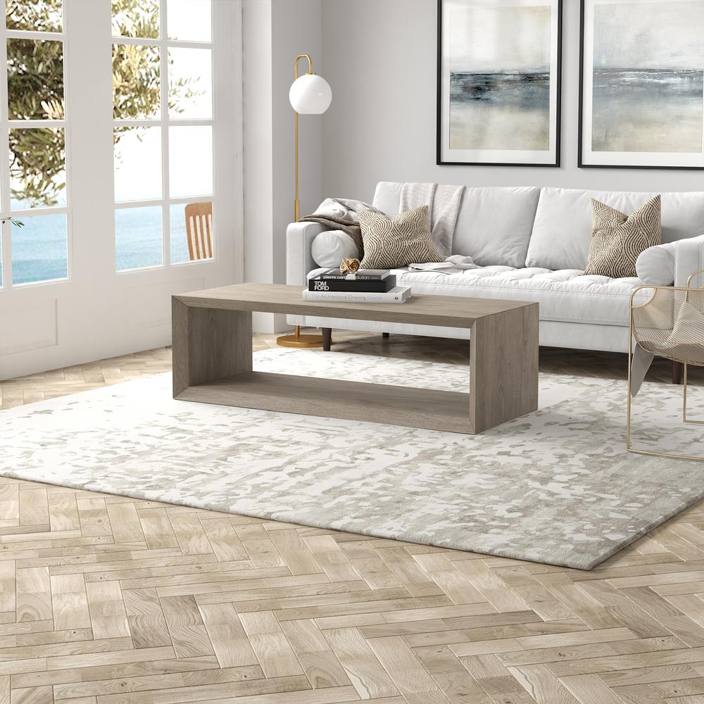 Osmond 58" Wide Rectangular Coffee Table in Antiqued Gray Oak