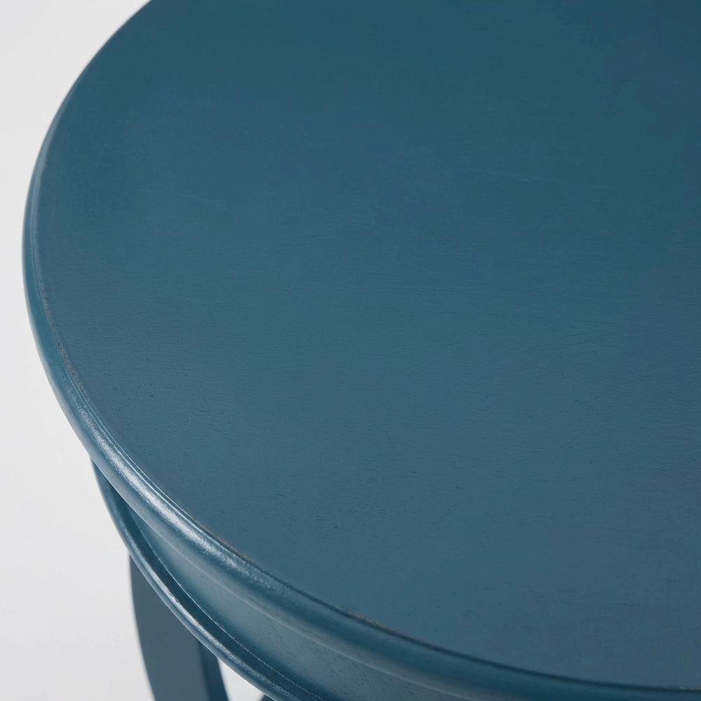 Teal Round Coffee Table with Lower Shelf and Modern Design