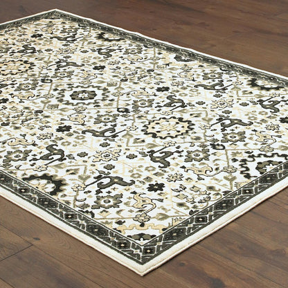 Bowen 073J2 Ivory/ Navy Indoor Area Rug - 3'10" x 5'5"