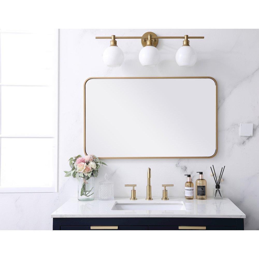 Soft corner metal rectangular mirror 22x36 inch in Brass