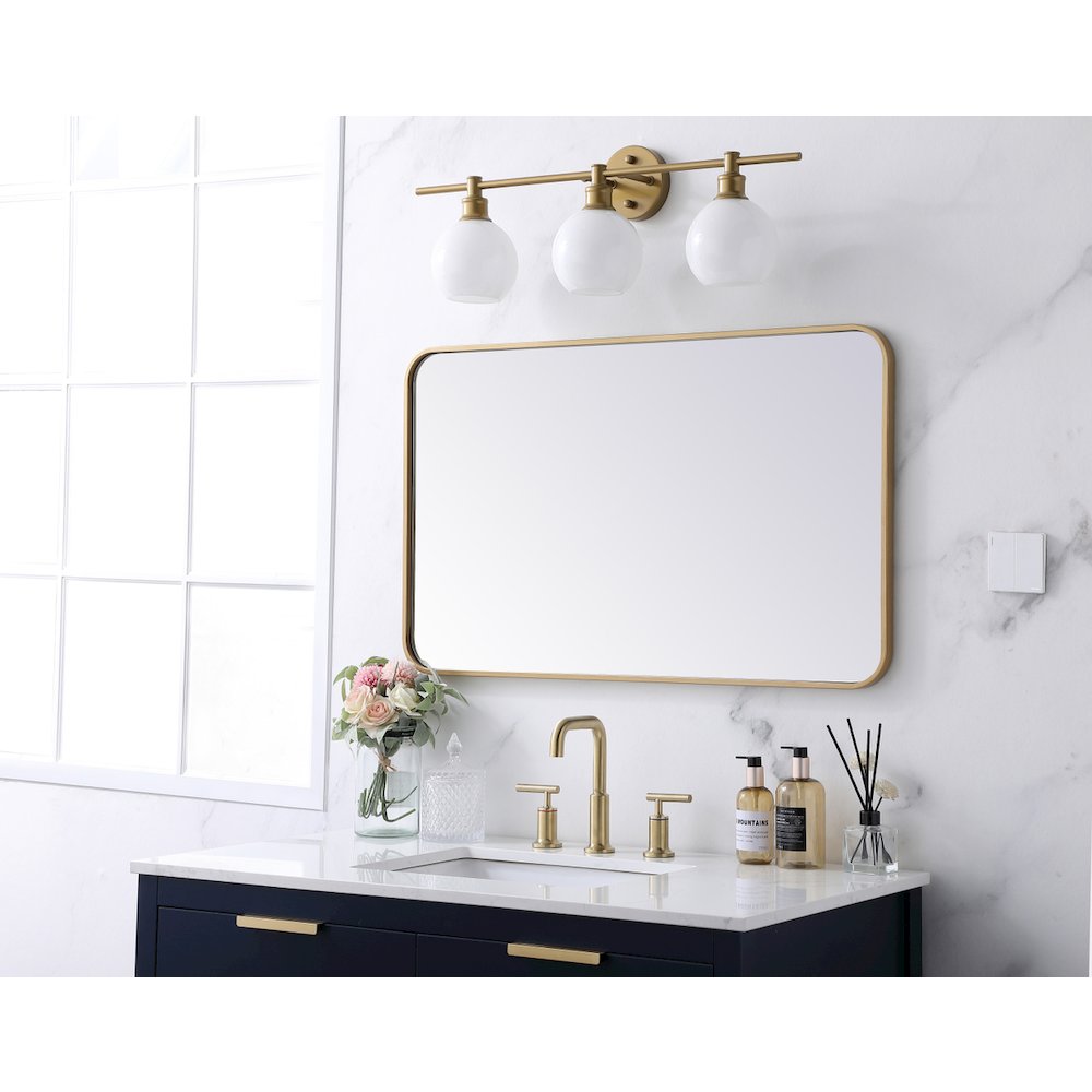 Soft corner metal rectangular mirror 22x36 inch in Brass