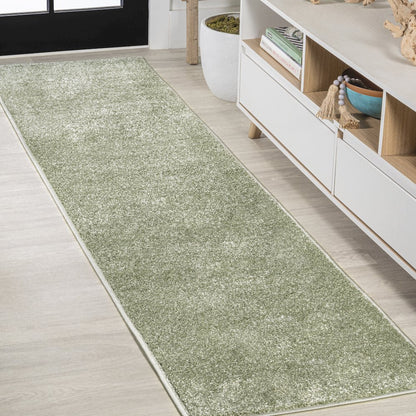 Haze Solid Low Pile Area Rug Green