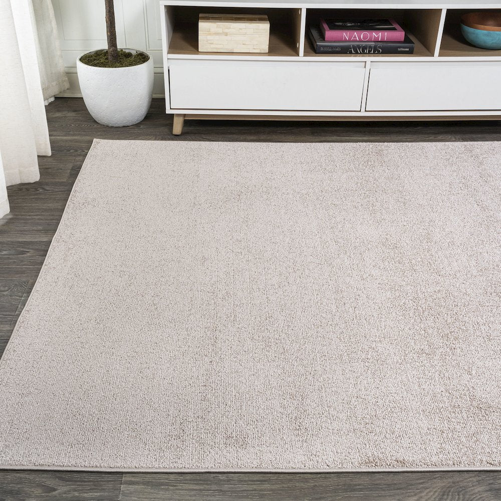 Haze Solid Low Pile Area Rug Beige