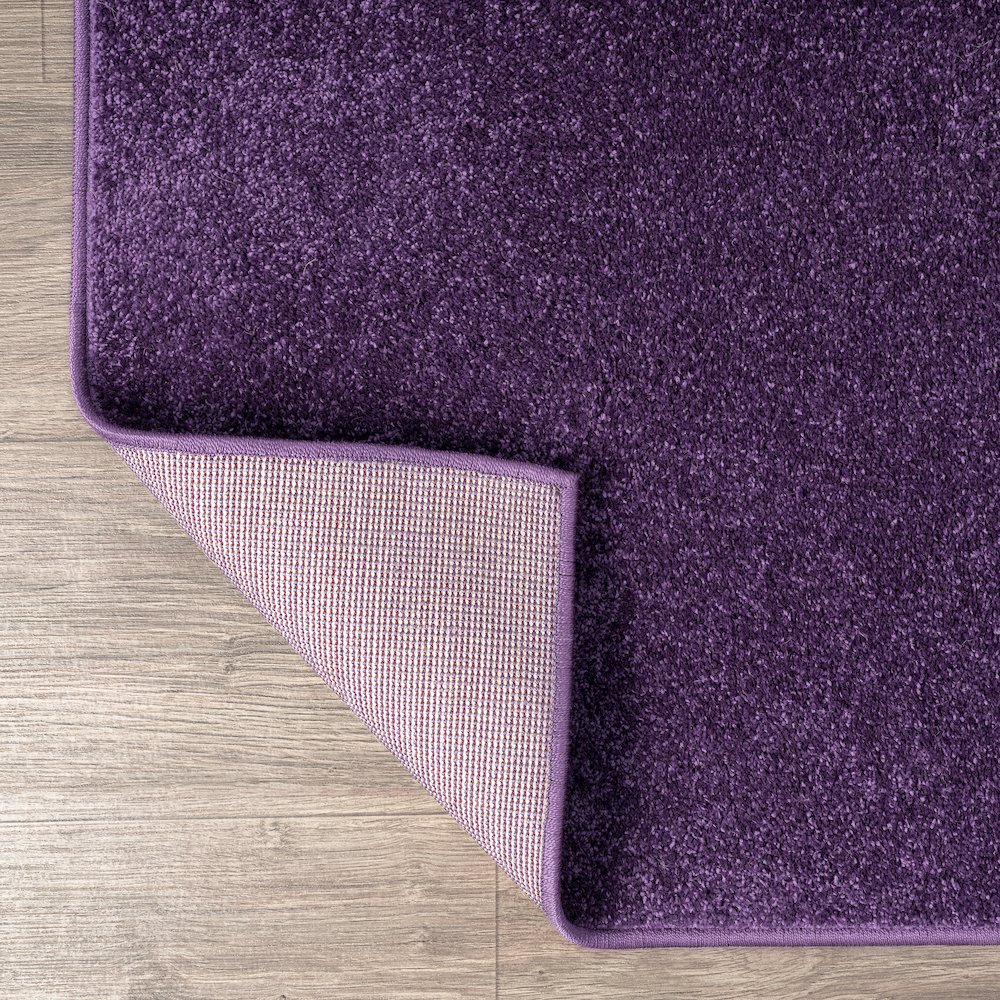 Haze Solid Low Pile Area Rug Purple