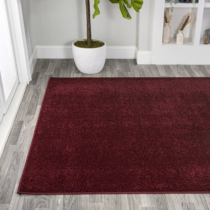 Haze Solid Low Pile Area Rug Dark Red