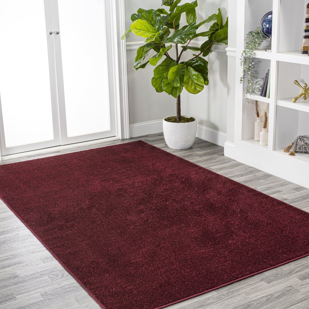 Haze Solid Low Pile Area Rug Dark Red