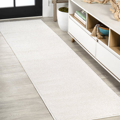 Haze Solid Low Pile Area Rug Cream