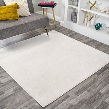 Haze Solid Low Pile Area Rug Cream