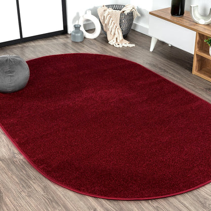Haze Solid Low Pile Area Rug Dark Red