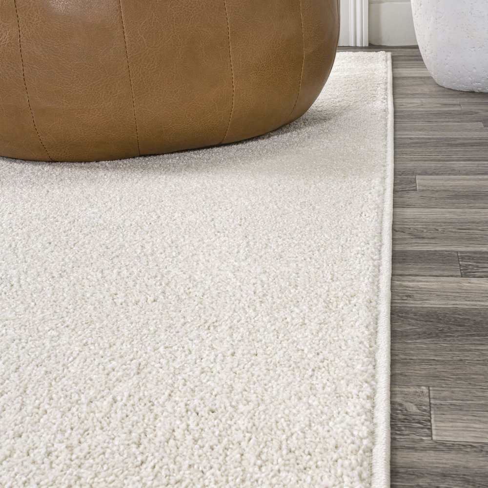 Haze Solid Low Pile Area Rug Cream