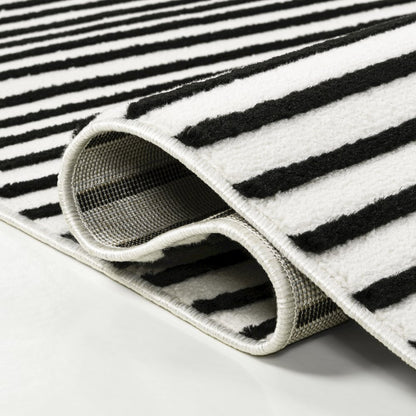 Anders MidCentury Modern Arch Stripe Two-Tone High-Low Black/White Area Rug