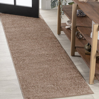 Haze Solid Low Pile Area Rug Brown