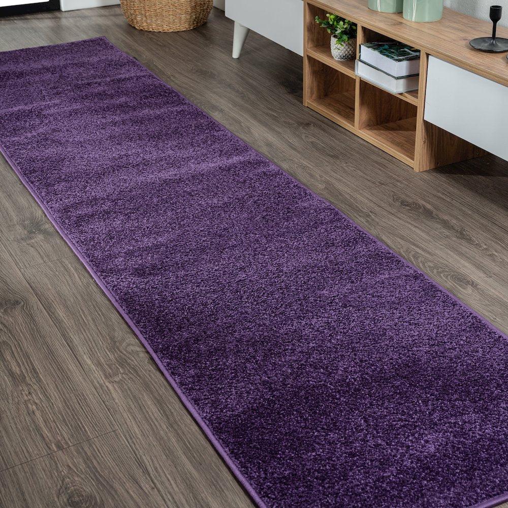 Haze Solid Low Pile Area Rug Purple