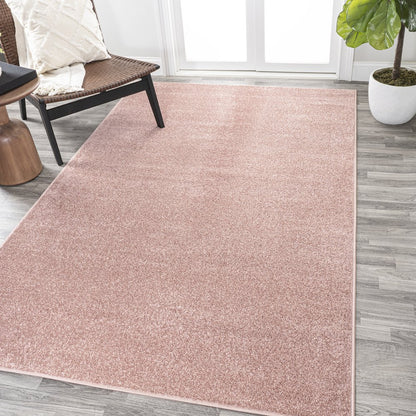 Haze Solid Low Pile Area Rug Pink