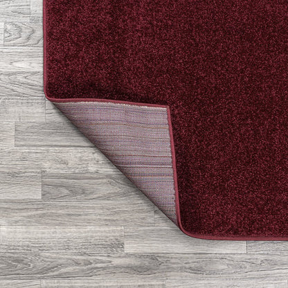 Haze Solid Low Pile Area Rug Dark Red