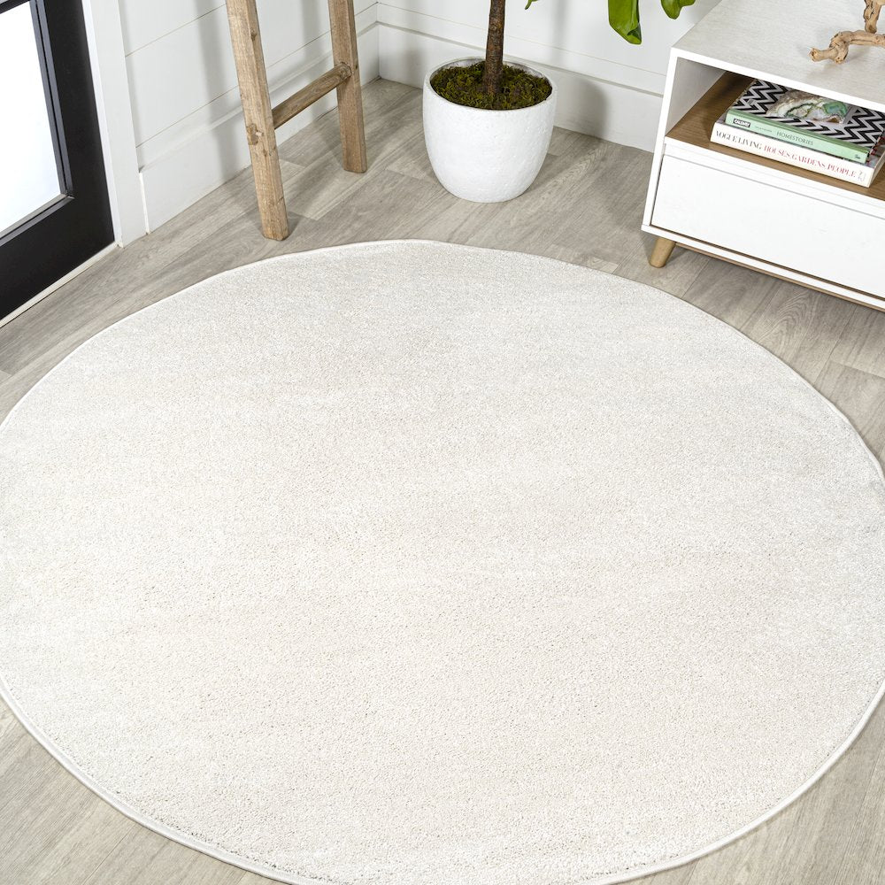Haze Solid Low Pile Area Rug Cream