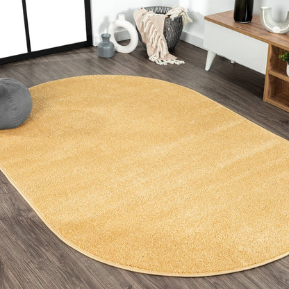 Haze Solid Low Pile Area Rug Mustard