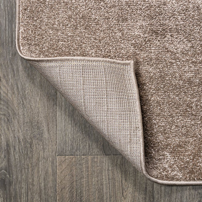 Haze Solid Low Pile Area Rug Brown