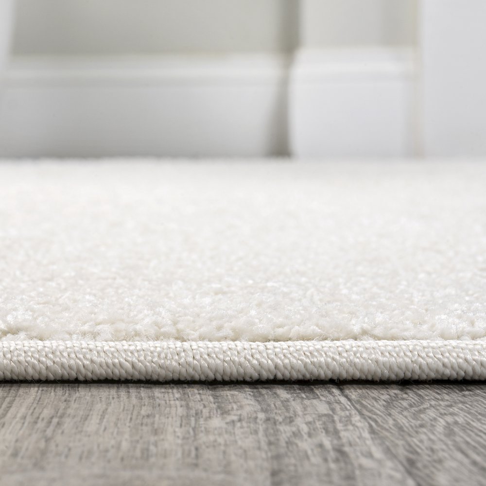 Haze Solid Low Pile Area Rug Cream
