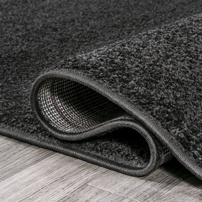 Haze Solid Low Pile Area Rug Black