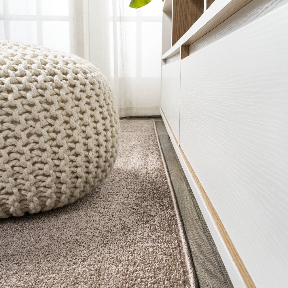 Haze Solid Low Pile Area Rug Brown