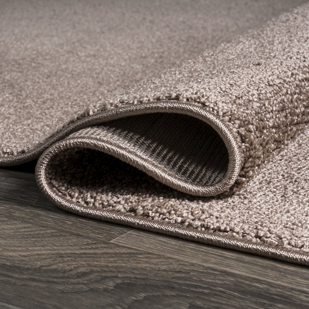 Haze Solid Low Pile Area Rug Brown