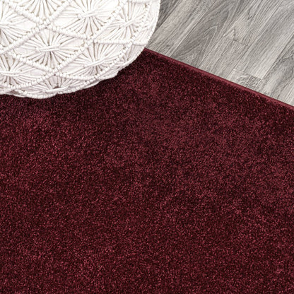Haze Solid Low Pile Area Rug Dark Red