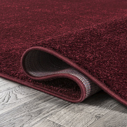 Haze Solid Low Pile Area Rug Dark Red