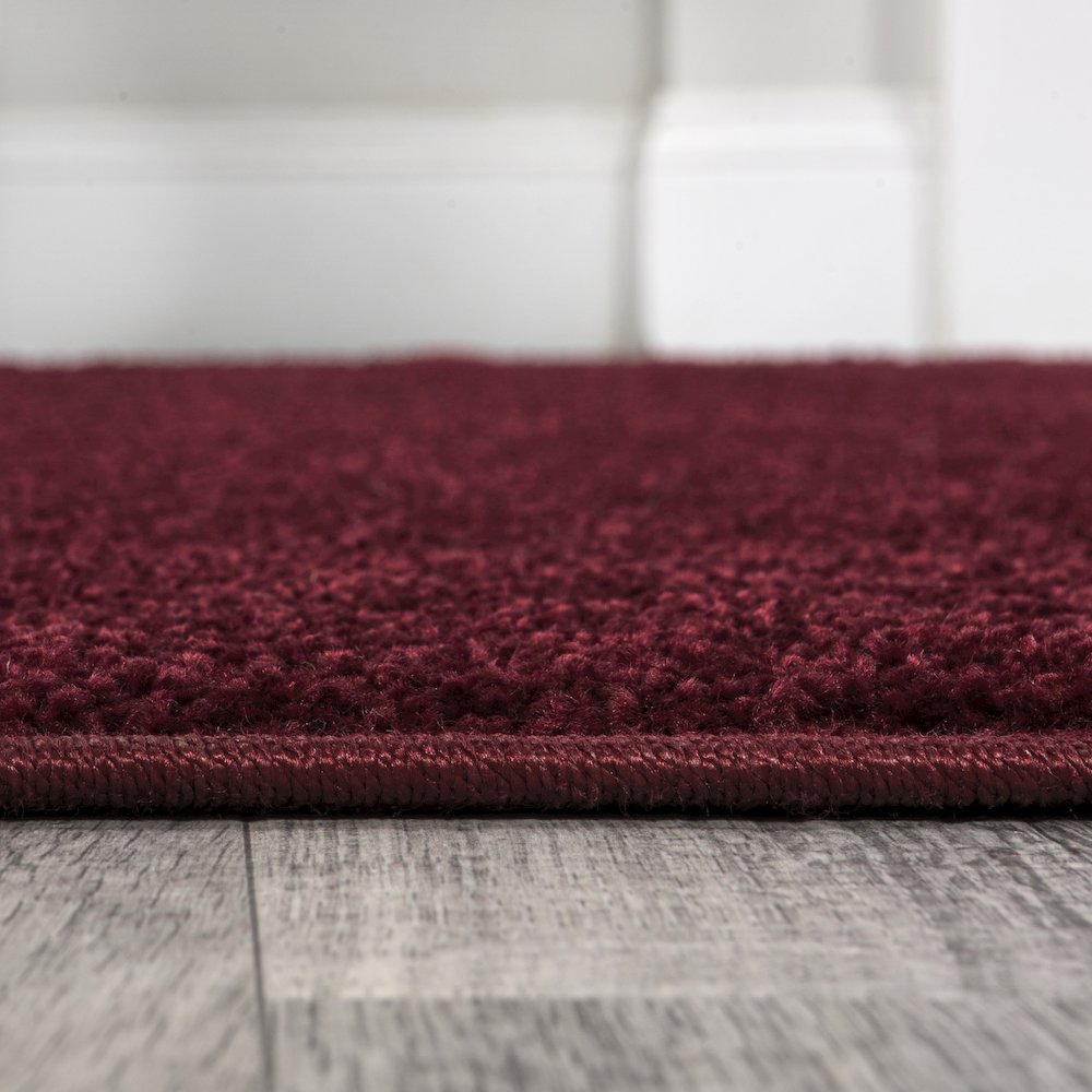 Haze Solid Low Pile Area Rug Dark Red
