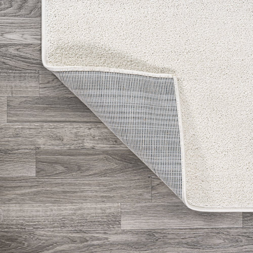 Haze Solid Low Pile Area Rug Cream