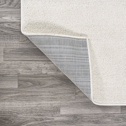 Haze Solid Low Pile Area Rug Cream