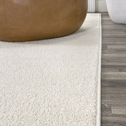 Haze Solid Low Pile Area Rug Cream